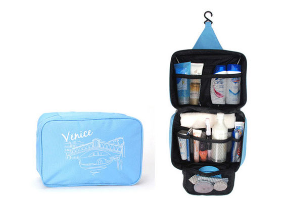 Το μπλε καμβά κλείνει το τηλέφωνο Toiletry την τσάντα, τσάντα Makeup ταξιδιού με την τυπωμένη ύλη συνήθειας